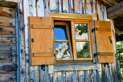 Reflection in the window of the next cottage